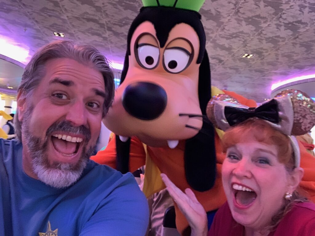 Tom and Michelle with Goofy aboard the Disney Wonder - Our Panama Canal Disney Cruise Recap