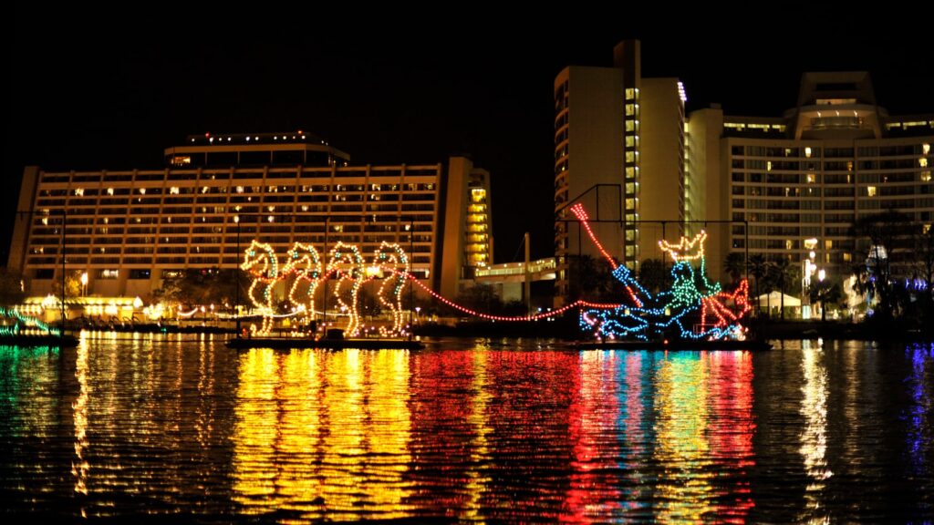 Electrical Water Pageant in from of Disney's Contemporary Resort - What Disney At The Holidays Means To Us