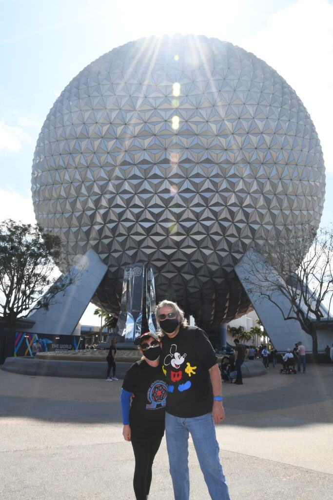 Tom and Michelle in front of Spaceship Earth in Epcot - Walt Disney World For The Disneyland Fan 2021
