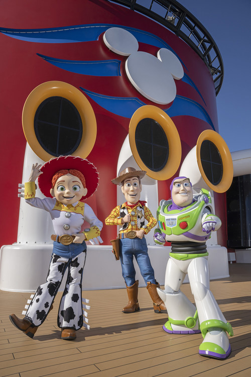 Buzz, Woody, and Jessie aboard a Disney Cruise ship for Pixar Day at Sea - An Exploration Of Disney's Encanto