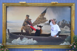 Tom and Michelle at EPCOT in photo pass image with George Washington 