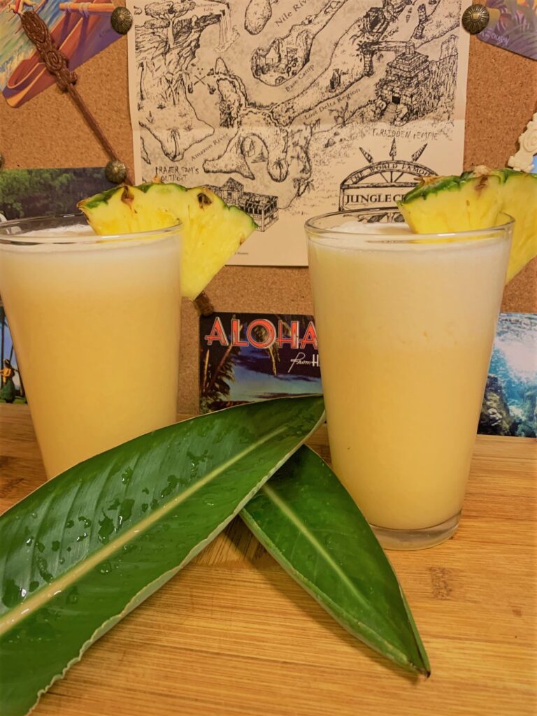 Two Disney Castaway Cay Konk Coolers to accompany the drink recipe