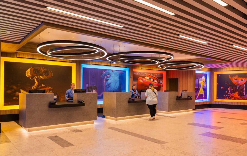 Front Desk are adorned with larger-than-life characters from beloved Pixar films along the walls
